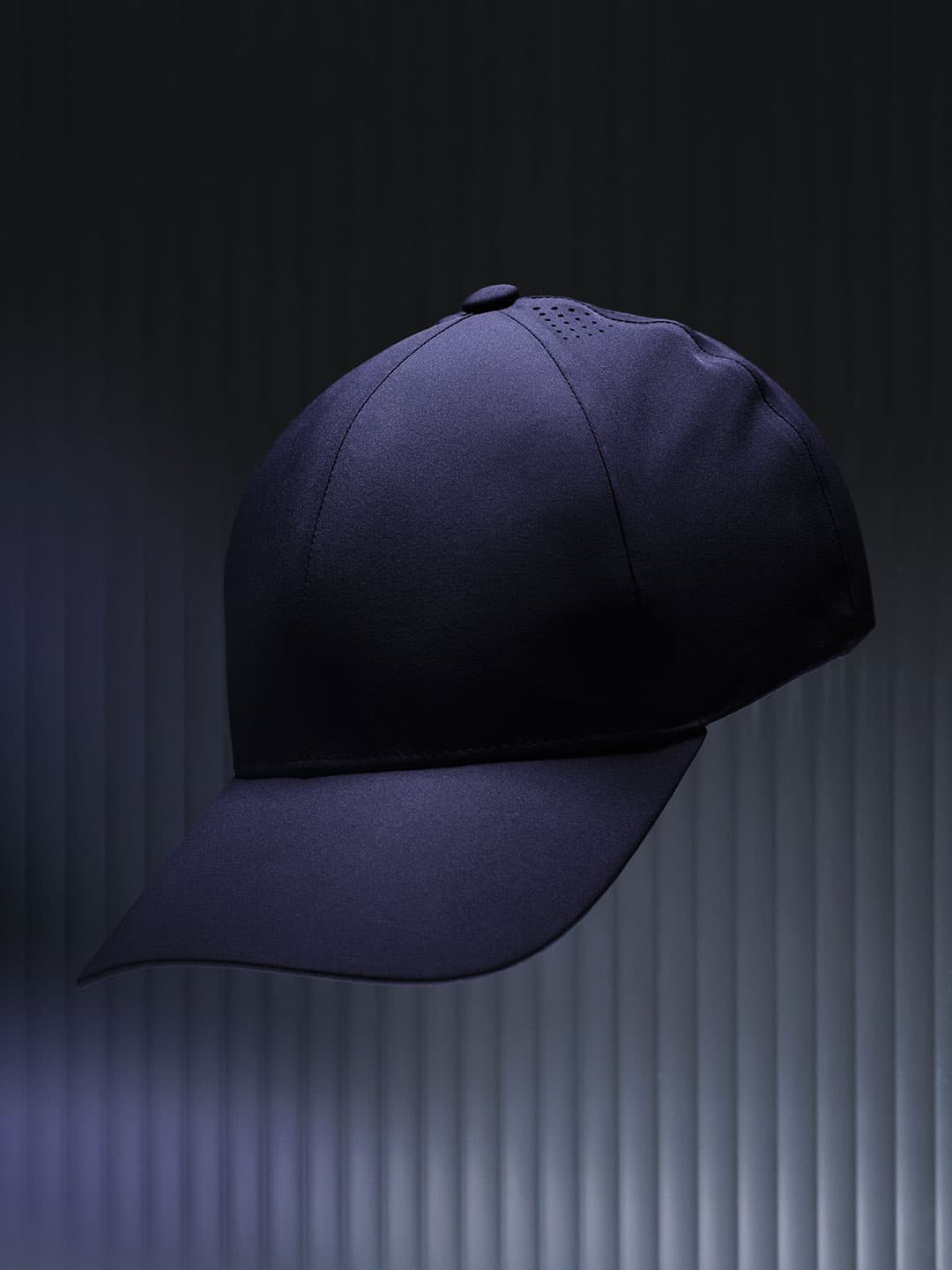 Front view of a navy mid intensity sport cap from Varsity Headwear