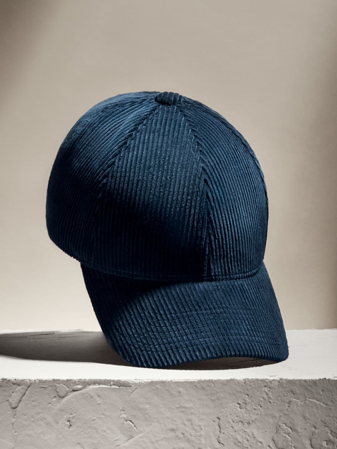 Front view of a blue legacy structured corduroy cap from varsity headwear