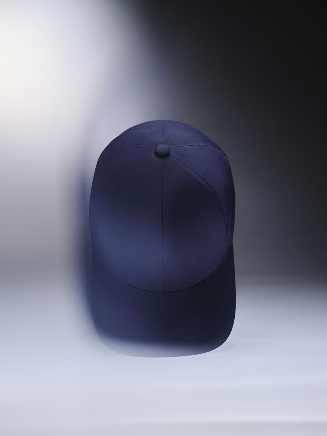 Front view of an legacy structured navy low intensity sport cap from varsity headwear