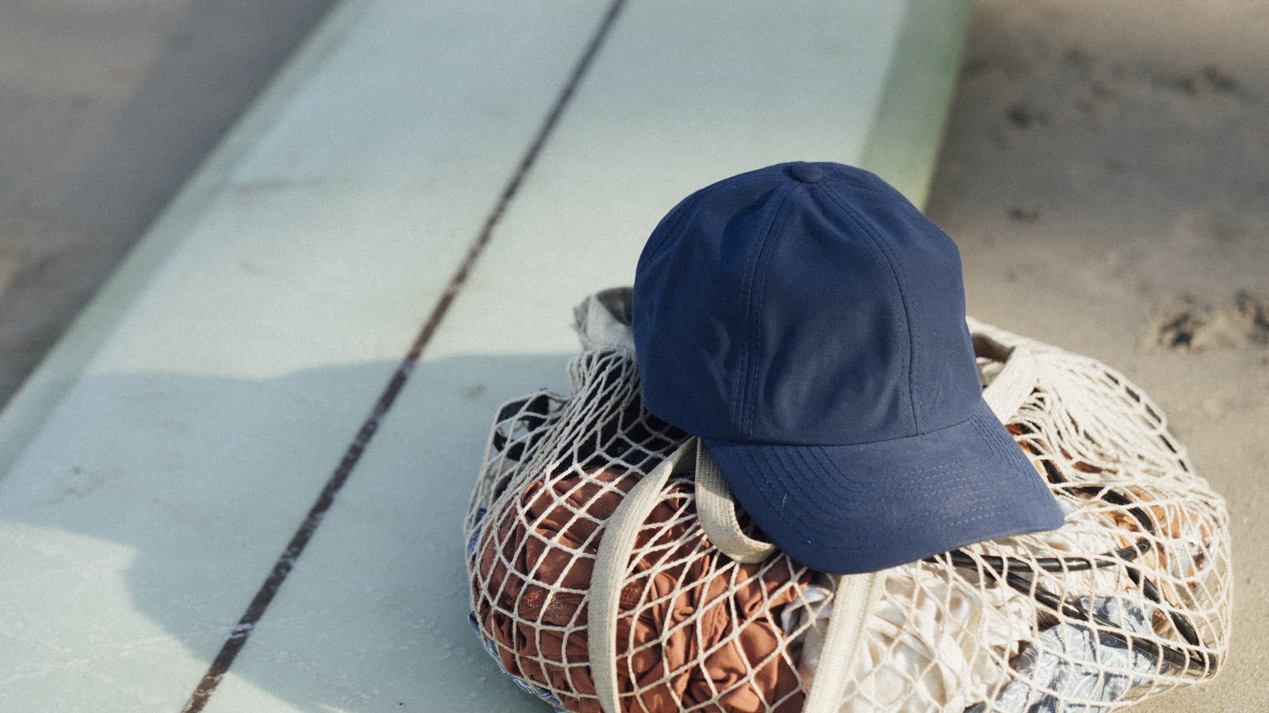 Navy seaqual cap at beach