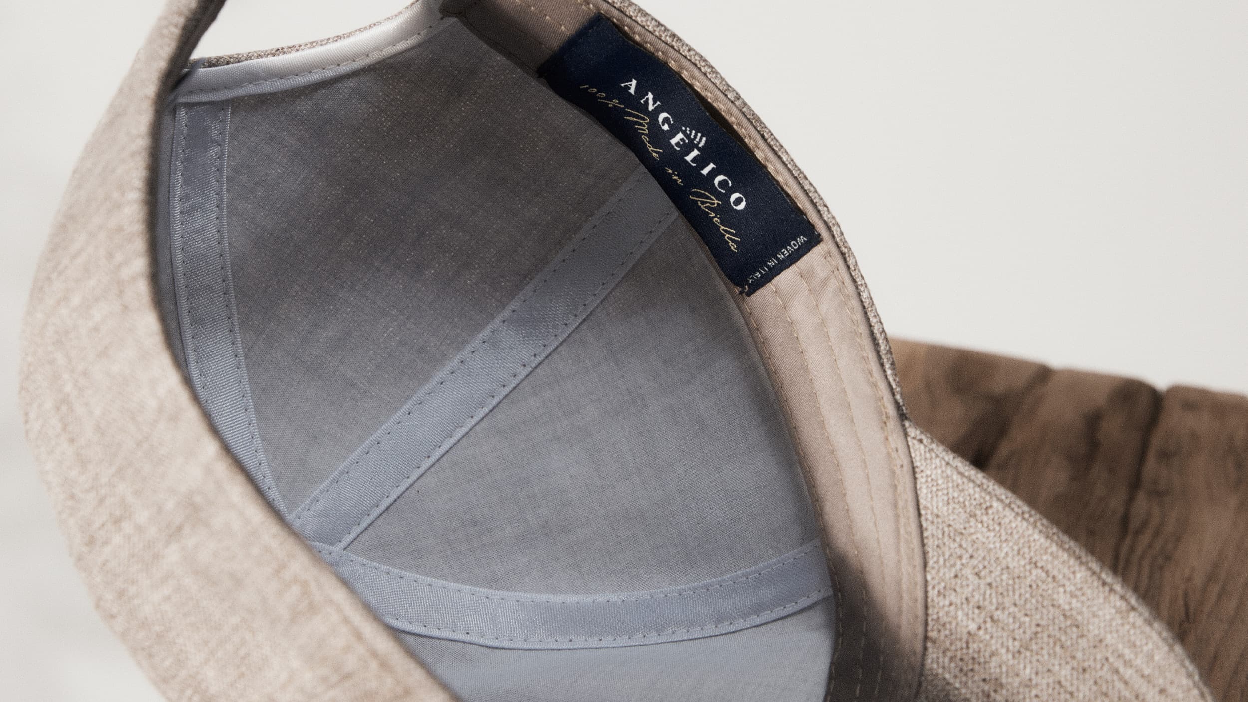 Detailed inside view of an argent khaki linen cap made of italian linen from Lanificio Angelico