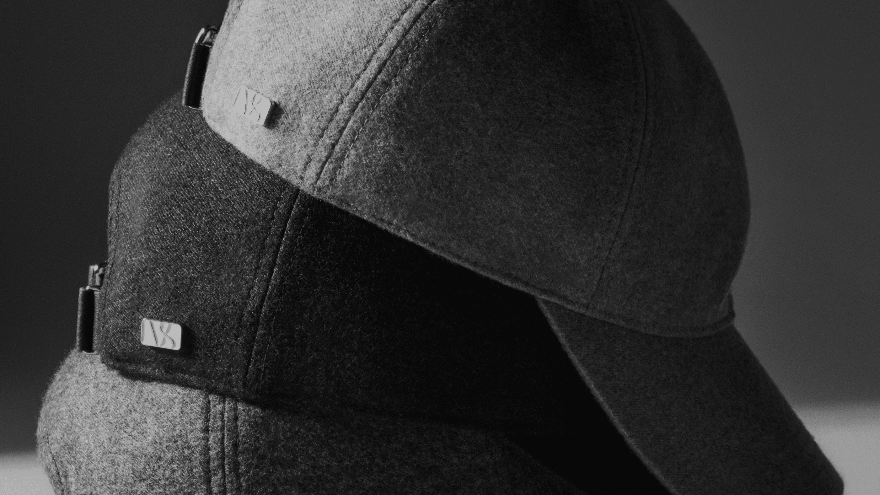 Side view of Loro Piana cashmere caps in three different colors from Varsity Headwear