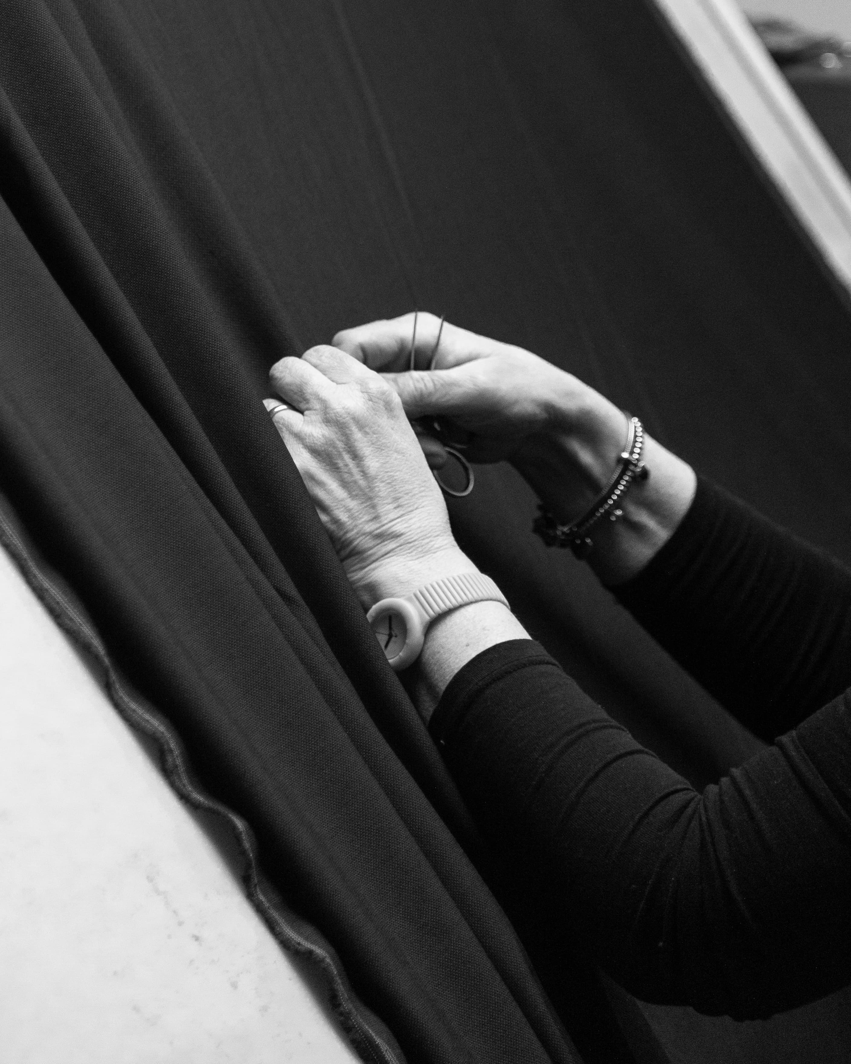 Behind the scenes photo from supplier angelico working with fabric